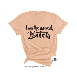 Designs by Prim I am the Moment Bitch Unisex Soft T-Shirt | Kenya Moore Funny Bravo Real Housewives of Atlanta RHOA Bravo Fan Graphic Quote Sayings Top Tee