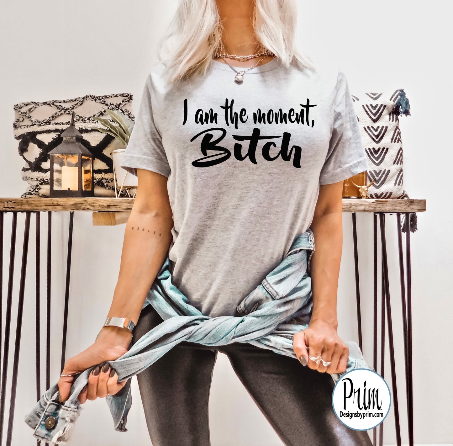 Designs by Prim I am the Moment Bitch Unisex Soft T-Shirt | Kenya Moore Funny Bravo Real Housewives of Atlanta RHOA Bravo Fan Graphic Quote Sayings Top Tee