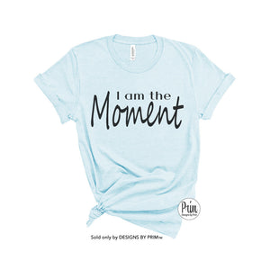 Designs by Prim I am the Moment Soft Unisex T-Shirt | RHOA Kenya Moore Atlanta Housewives Funny Bravo Fan Quote Graphic Tee Top